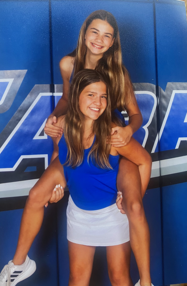 Kylah and Sophia on picture day for tennis. 